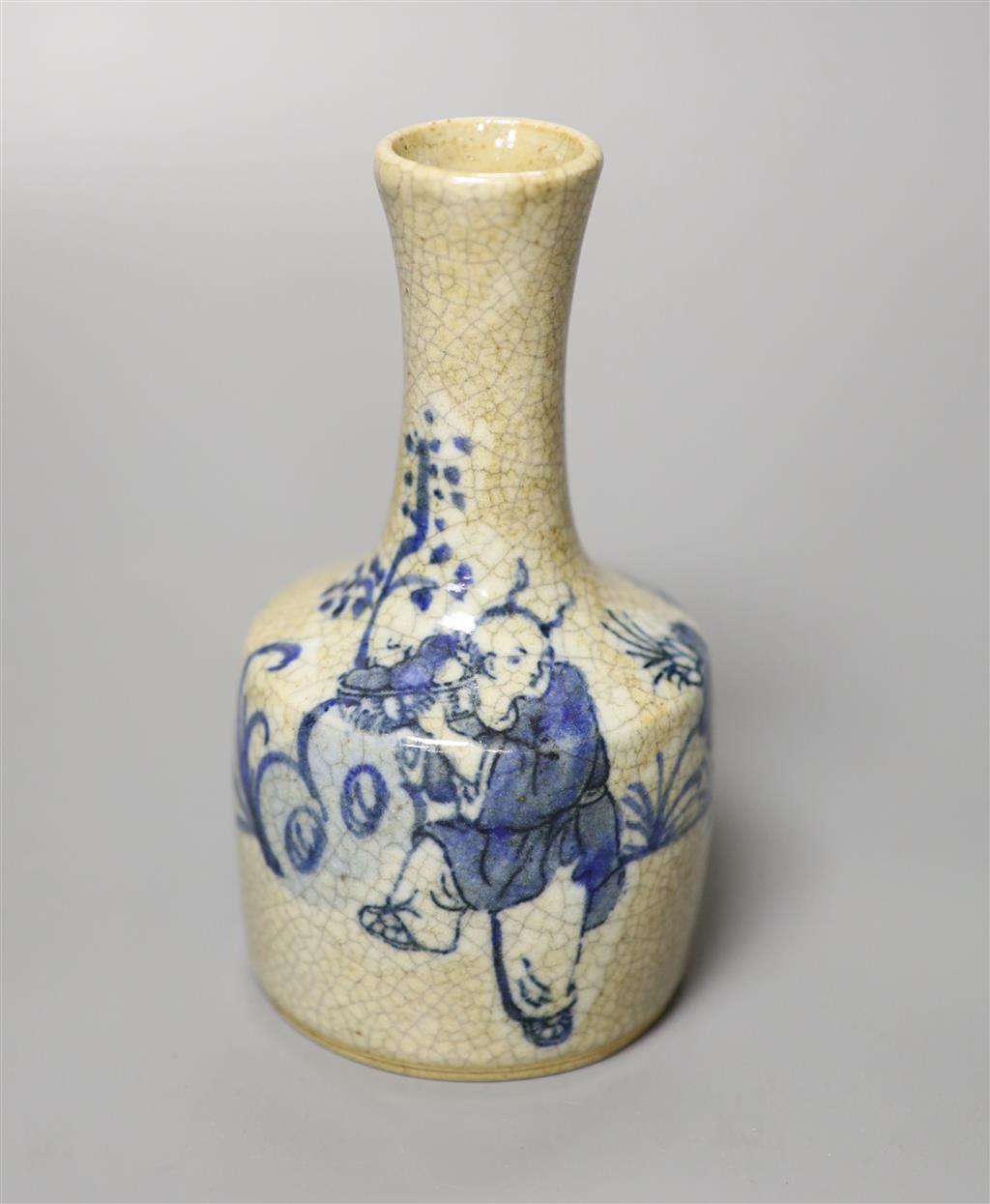 A Chinese blue and white crackle glaze bottle vase, height 14.5cm